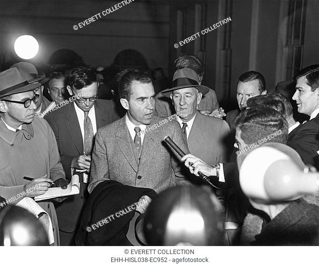 Vice President Richard Nixon with reporters on Nov. 26, 1957. They questioned the VP on Eisenhower's mild stroke of the previous day which left the President...