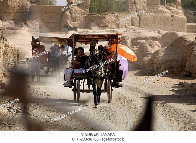 Donkey cart running at Gaocheng Khocho Ruins, Turpan, Xinjiang, China