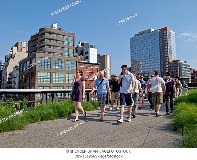 People stroll on the High Line, a 1-mile New York City park built on a section of former elevated railroad along the lower west side of Manhattan  It has been...