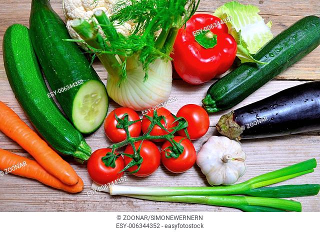 fresh vegetables on wooden board