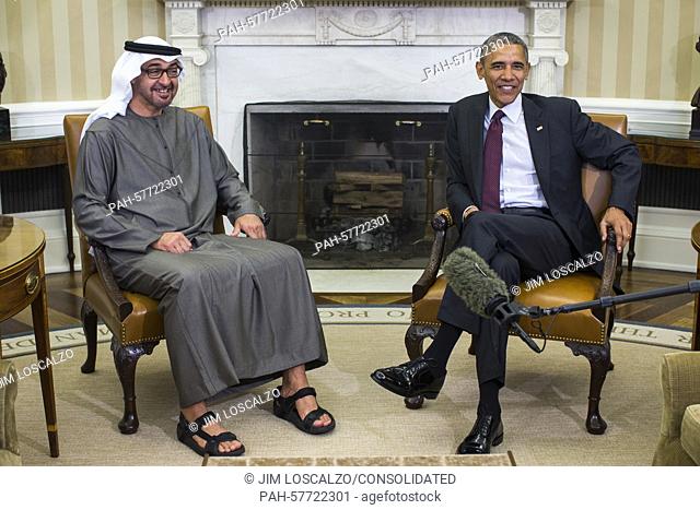 US President Barack Obama (R) greets Crown Prince Mohammed Bin Zayed Al Nahyan (L) of the United Arab Emirates in the Oval Office of the White House in...