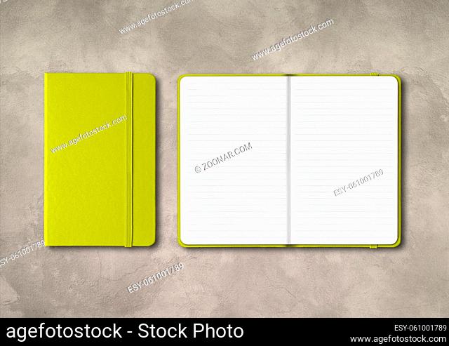 Lime green closed and open lined notebooks mockup isolated on concrete background