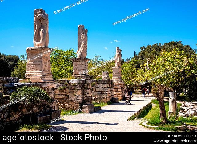 Athens, Attica / Greece - 2018/04/02: Panoramic view of ancient Athenian Agora archeological area with Odeon of Agrippa and Gymnasium ruins