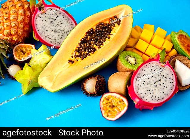 close up of papaya with other exotic fruits