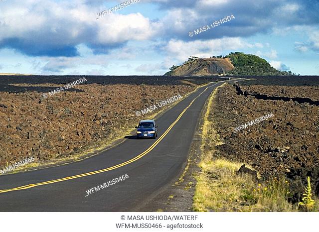 Saddle Road and Pu`u Huluhulu old cinder cone created by Mauna Kea, Mauna Kea, Big Island, Hawaii, USA