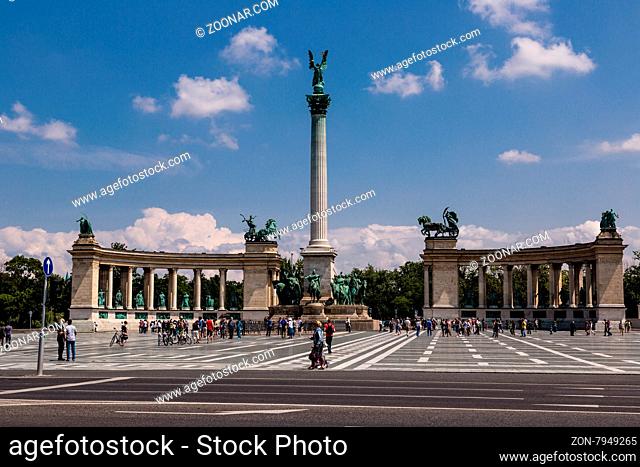 BUDAPEST - CIRCA MAY 2013: Tourists visit Millennium Monument in Heroes Square circa May 2013 in Budapest, Hungary. This square has been UNESCO World Heritage...