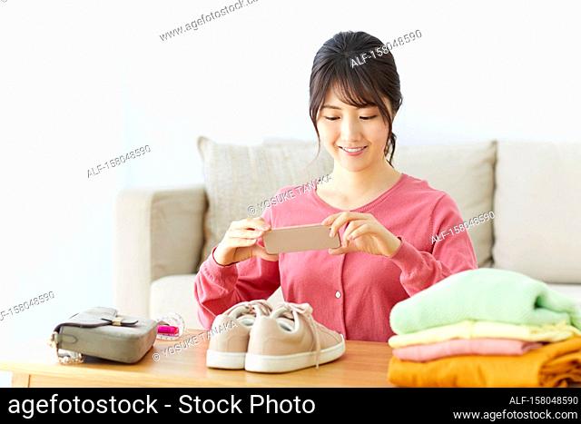 Japanese woman selling clothes online