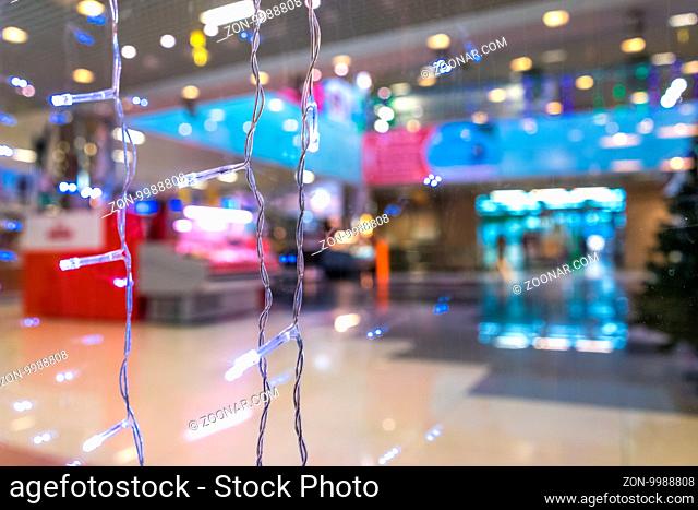Shopping Mall Interior, Christmas Shopping Mall Defocused Background, Shopping Center, Abstract Blur Image of Shopping Mall and People on Christmas Time for...