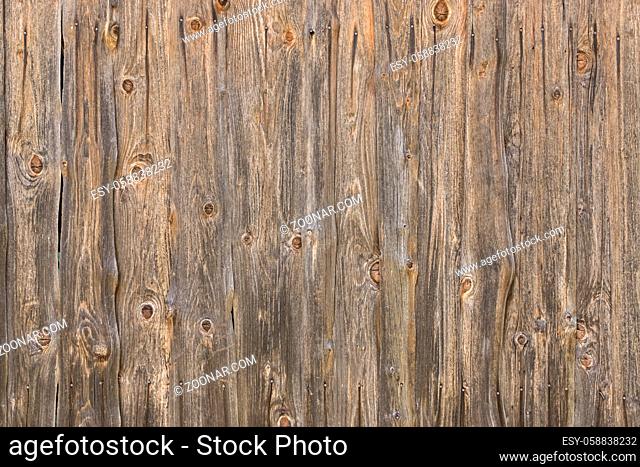 Natural brown barn wood wall. Wall texture background pattern. Wood planks, boards are old with a beautiful rustic look, style