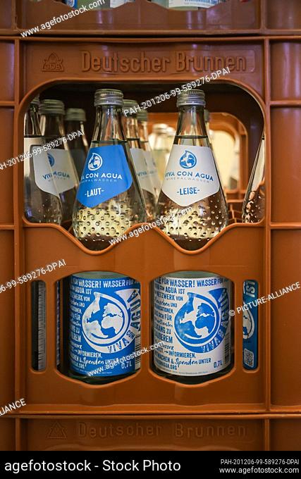 05 December 2020, Hamburg: Mineral water bottles of the brand ""Viva con Agua"" are in a beverage crate. The mineral water is a licensed product of Viva con...