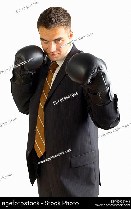 Businessman in black boxing gloves, isolated on white in studio. Looking at camera