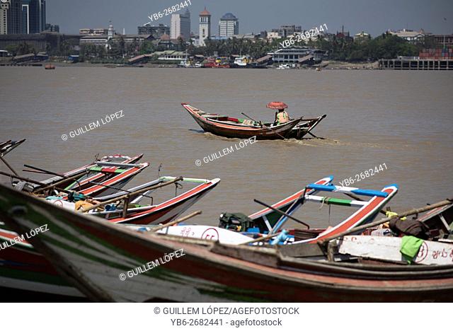 A long tail boat in the Irrawaddy River in Dala, Yangon, Myanmar
