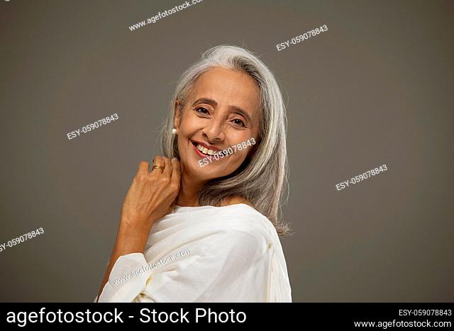 Portrait of old beautiful woman smiling