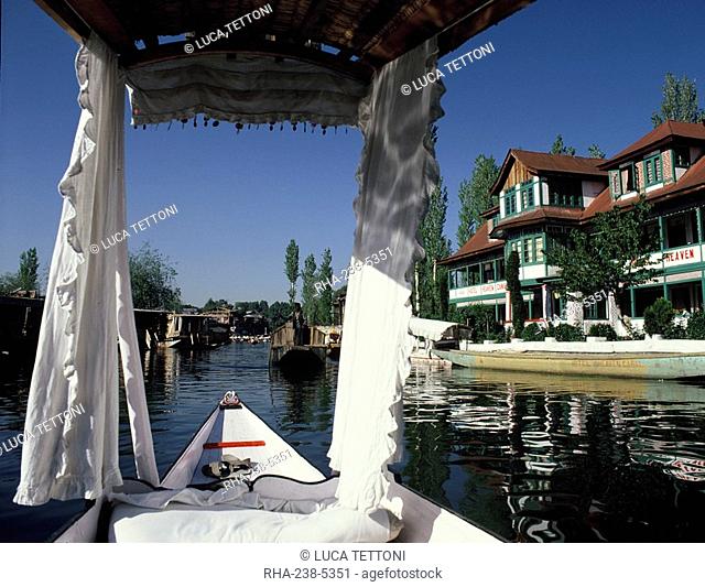 Shikara on the waterways of Srinagar, Kashmir, India, Asia