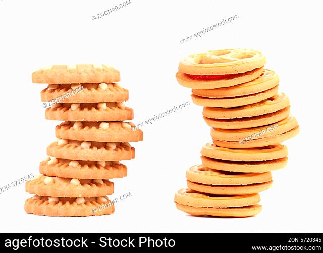 Stack of smile biscuits and another. White background