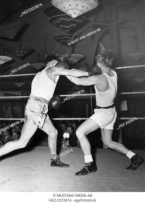 Boxing match between Knud Larsen of Denmark and Lennart Persson, representing Sweden. From the Trelleborgs Museum Collection