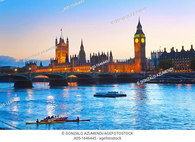 Night kayaking Thames River, Big Ben and Houses of Parliament  Westminster, London, England, United Kingdom, Europe