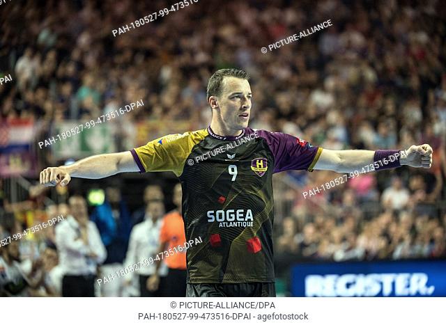 27 May 2018, Germany, Cologne: Handball Champions League final, HBC Nantes vs Montpellier HB at the Lanxess Arena: Dominik Klein of Nantes celebrates after a...