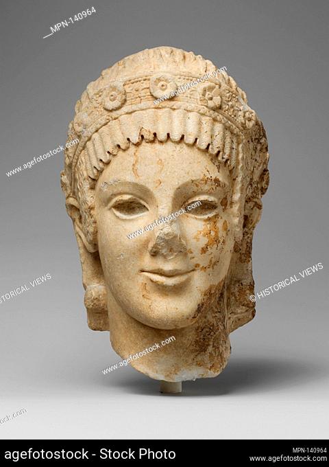 Marble head of Athena. Period: Augustan or Julio-Claudian; Date: ca. 27 B.C.-A.D. 68; Culture: Roman; Medium: Marble, Island; Dimensions: H. 9 3/8 in
