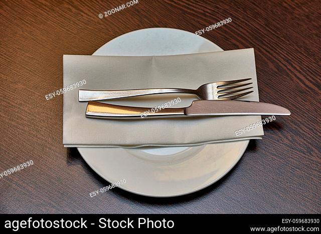 Shiny cutlery set in a restaurant