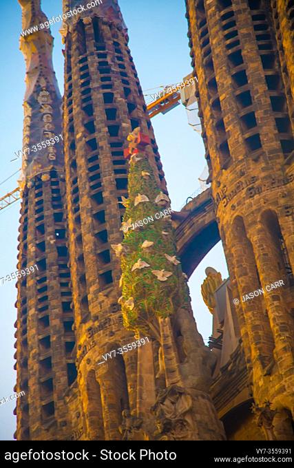 BARCELONA, SPAIN - December 25, 2018: La Sagrada Familia's construction in progress during the Christmas season. It is on the part of UNESCO World Heritage site...