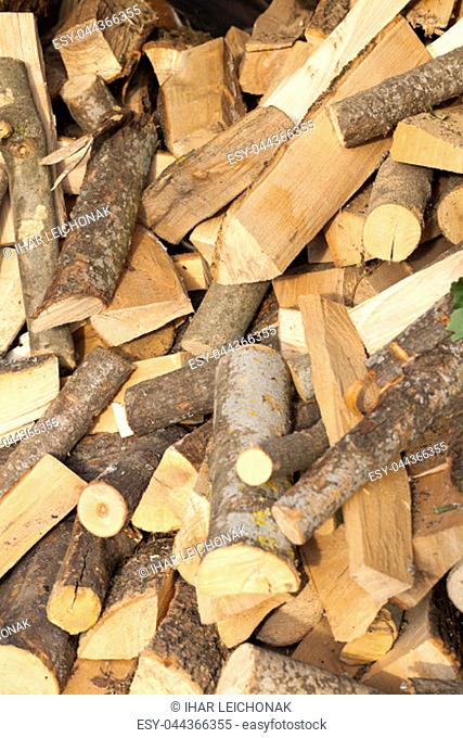 sawn and chopped tree trunks for kindling furnaces, close-up in the village