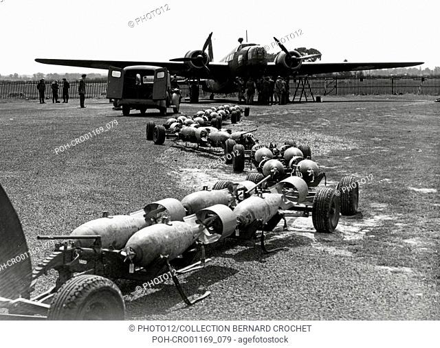 British twin-engine Vickers Wellington Mk.I medium bomberin the process of its bombs being loaded, at the Mildenhall (Great Britain) airfield