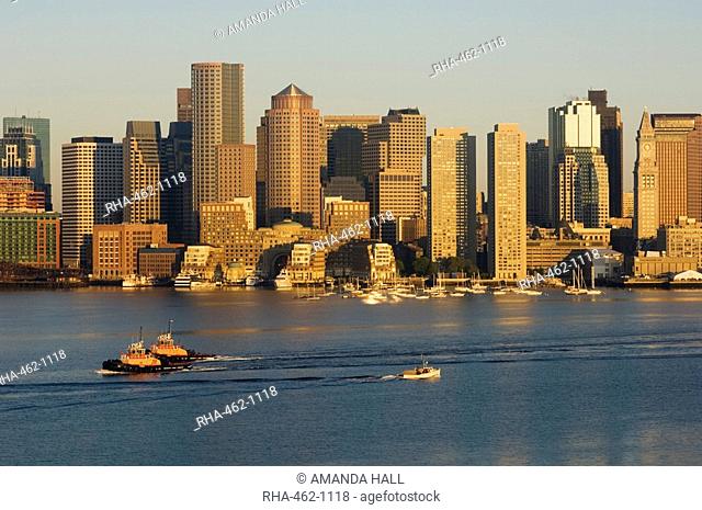 City skyline at dawn across Boston Harbor, Boston, Massachusetts, USA