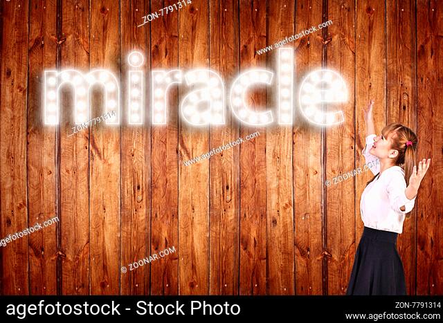 Schoolgirl with singboard word over wood background