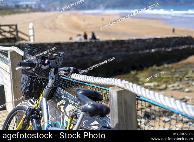 Bicycles parked on the beach, summer times