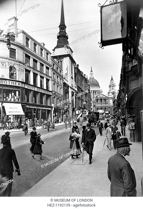 People walking down Ludgate Hill, City of London, (c1910s?). St Paul's Cathedral is in the background