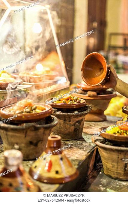 Selection of very colorful Moroccan tajines (traditional casserole dishes)