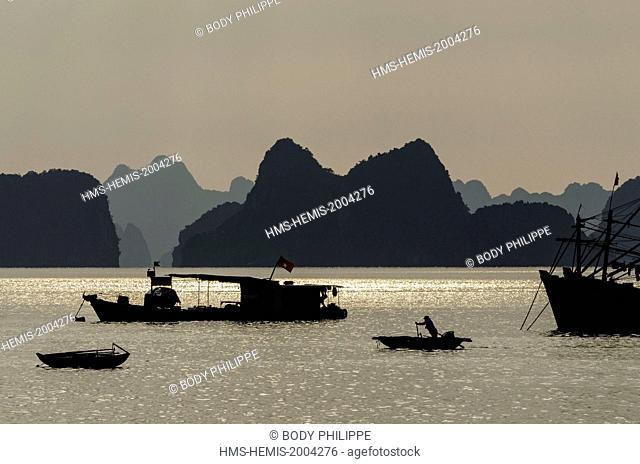 Vietnam, Quang Ninh province, Ha Long bay, listed as World Heritage by UNESCO, fishing boats in the port of Cai Rong