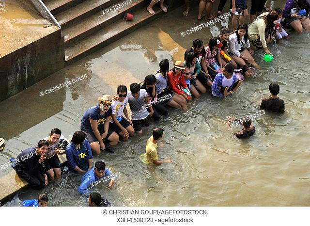 young people bathing into the Chao Praya river, Songkran festival, New Year's Day, Ayutthaya, Thailand, Asia