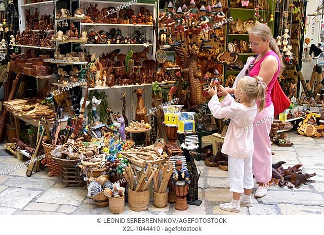 Mother and daughter shop for toys and souvenirs  Kerkyra old town, Corfu, Greece