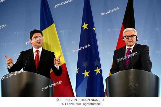Federal Minister for Foreign Affairs, Frank-Walter Steinmeier (R, SPD) and Romanian Minister for Foreign Affairs Titus Corlatean speak during a press conference...