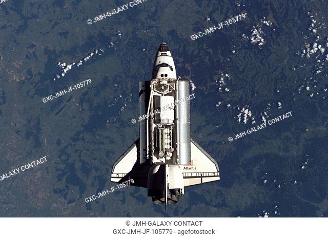 This overhead image of the Space Shuttle Atlantis (STS-115), recorded by an Expedition 13 crew member onboard the International Space Station
