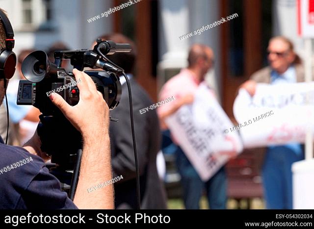 Filming public demonstration with a video camera