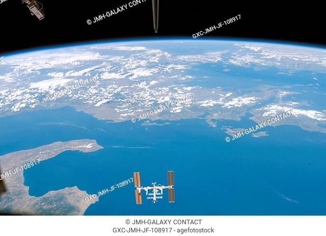 The International Space Station is featured in this image photographed by a STS-118 crewmember on the Space Shuttle Endeavour following the undocking of the two...