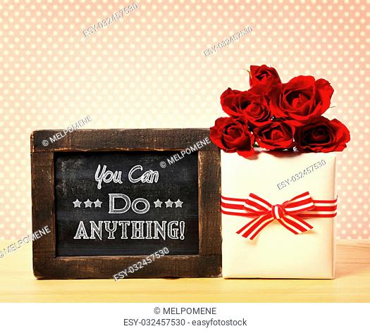You can do anything message written on little chalkboard with roses and gift box