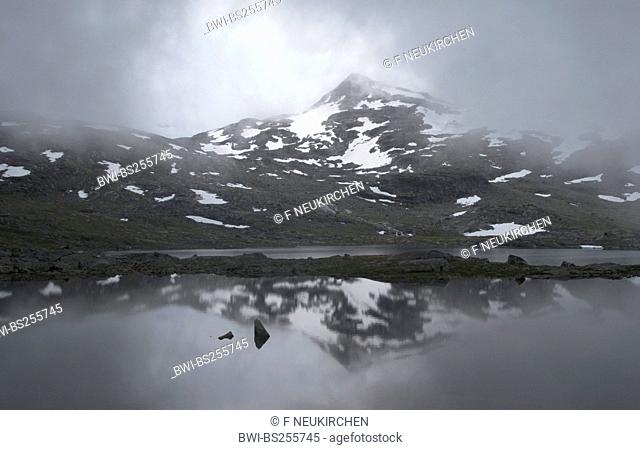 waft of mist over a mountain lake, Norway, Jotunheimen National Park