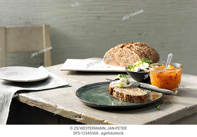 Quinoa and seed bread with mountain cheese, and apricot jam with lavender blossoms