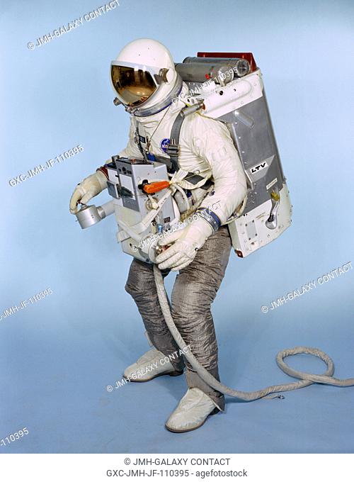 Test subject Fred Spross, Crew Systems Division, wears an Astronaut Maneuvering Unit (AMU). The Gemini spacesuit, AMU backpack