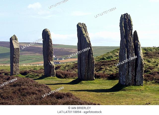 The Standing Stones o' Stenness were originally laid out in an ellipse. Henge. Stone circle. Tall upright megaliths. The Standing Stones of Stenness form an...