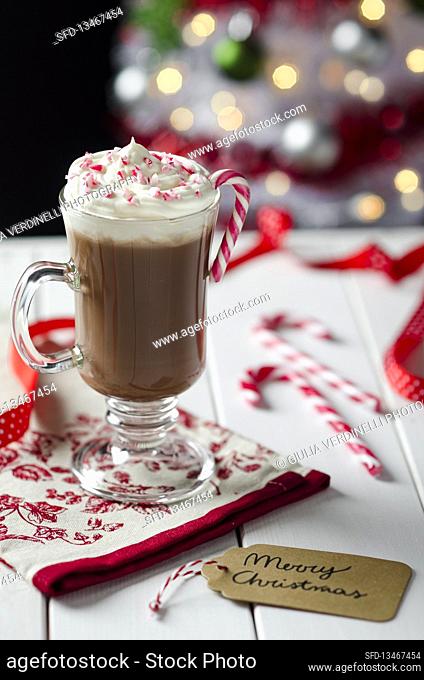 Glass of hot chocolate with Christmas mood and lights
