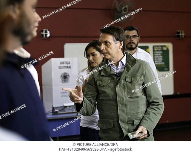28 October 2018, Brazil, Rio de Janeiro: Jair Bolsonaro, ultra-right candidate for the office of Brazilian president, arriving to vote in a polling station
