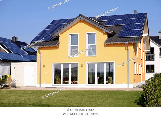Germany, Grevenbroich, new built one-family house with solar panels on roof top