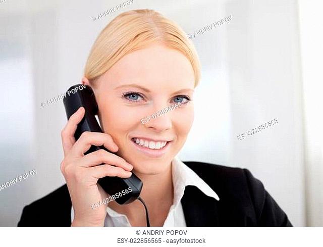 Beautiful businesswomen talking on the phone