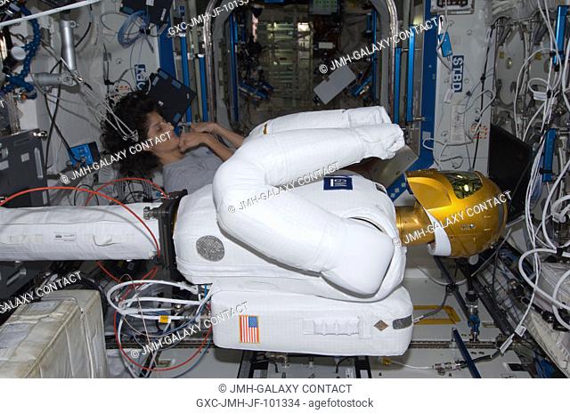 NASA astronaut Sunita Williams, Expedition 32 flight engineer, poses for a photo with Robonaut 2 humanoid robot in the Destiny laboratory of the International...