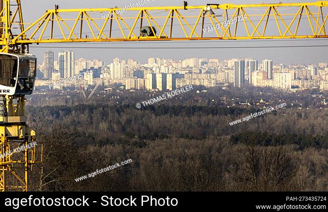 Construction crane in front of prefabricated building in Kyiv. - Kyiv/Ukraine